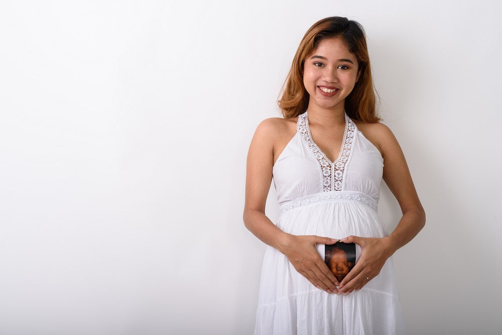 When Does Your Baby Bump Start to Show? 3 Keys to Your Pregnancy Glow